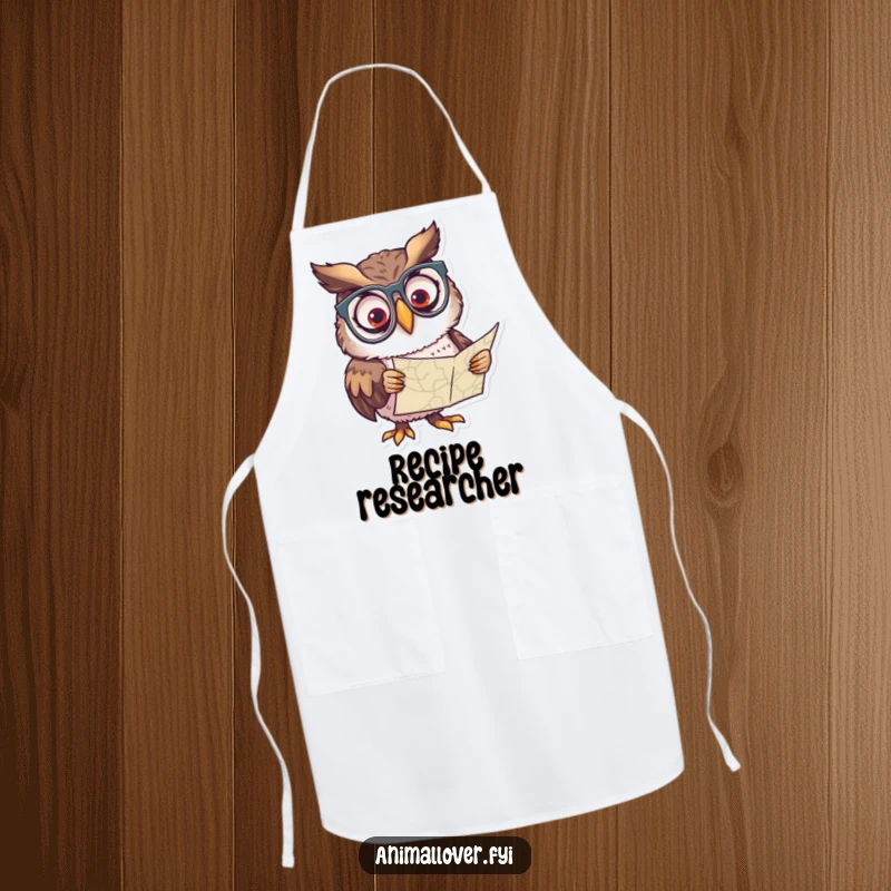 Funny apron with a curious owl wearing glasses, peering at a map, ideal for cooking.
