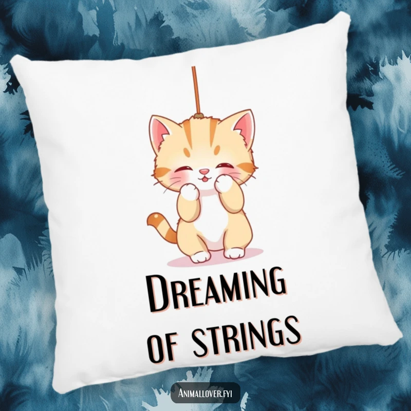 Funny Pillow: A charming kitten is caught in the act of playfully batting at a dangling string, adding cozy humor.