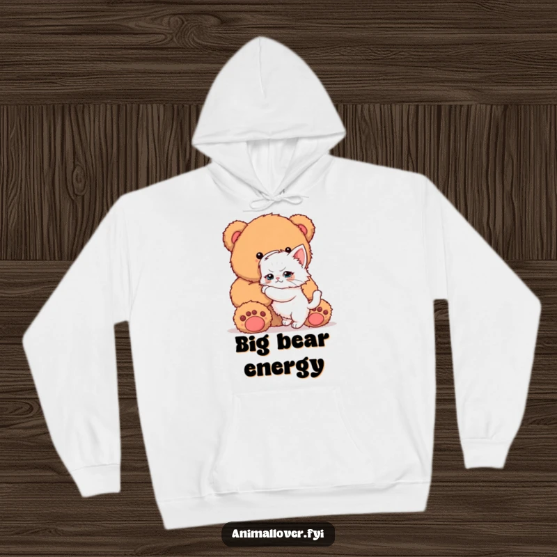 Funny Kitten Hoodie: A warm, comfortable hoodie displaying a determined kitten making a valiant attempt to hug a giant teddy bear.