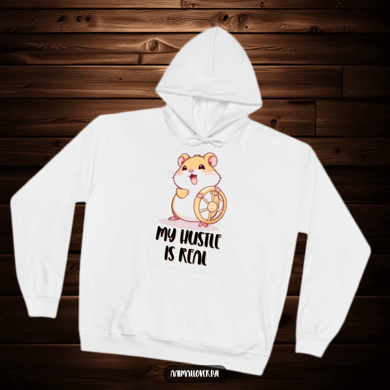 Funny hamster hoodie showing a joyful little creature pushing its wheel with all its might, embodying exercise and fun.