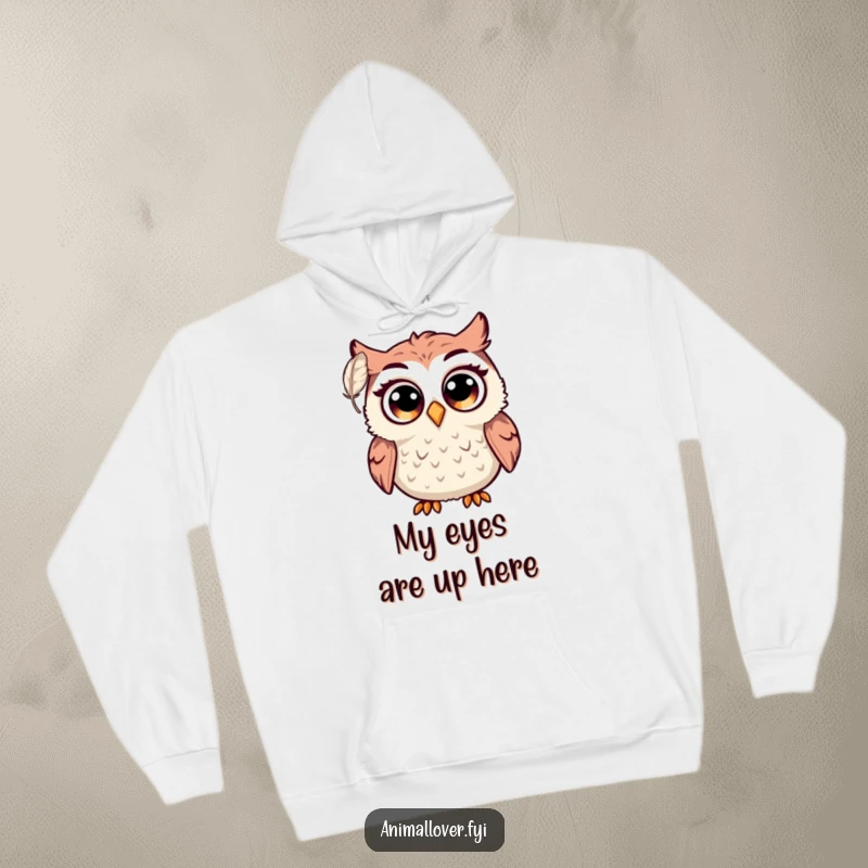 Funny owl hoodie illustration of a startled bird with massive eyes reacting to a small floating feather, designed for laughs.