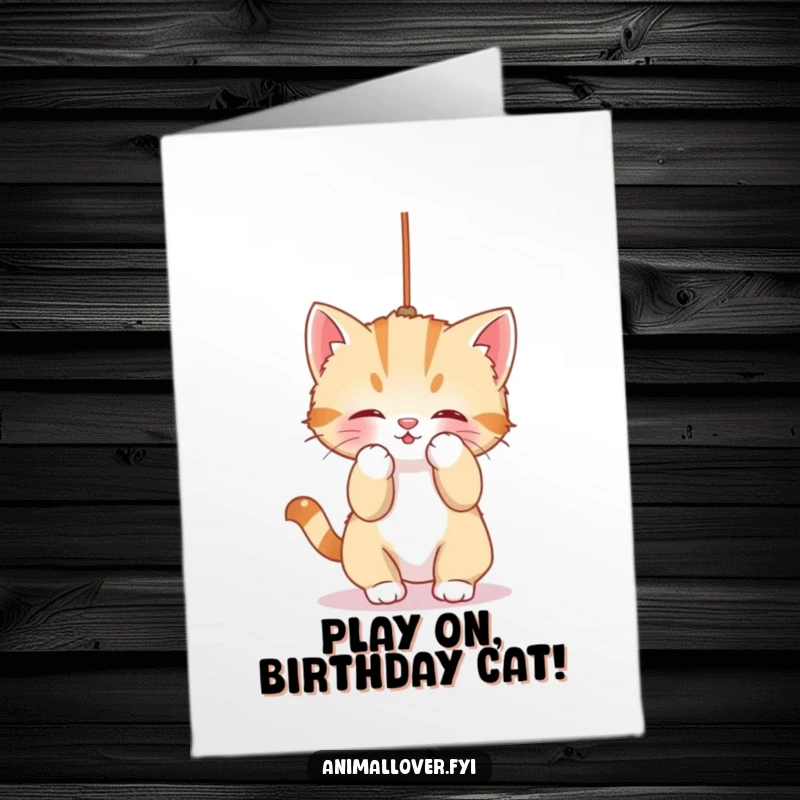 Funny Free Printable Birthday Card: Adorable kitten playfully batting at a dangling string, celebrating a cozy birthday.