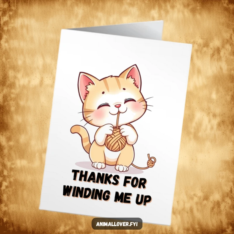 Funny Free Printable Thank You Card: A curious cat batting at yarn, expressing thanks with playful charm.