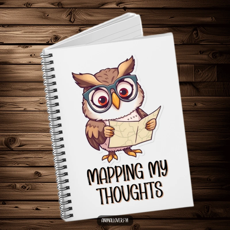 Funny notebook featuring a curious owl wearing spectacles, peering intently at a map, perfect for writing.