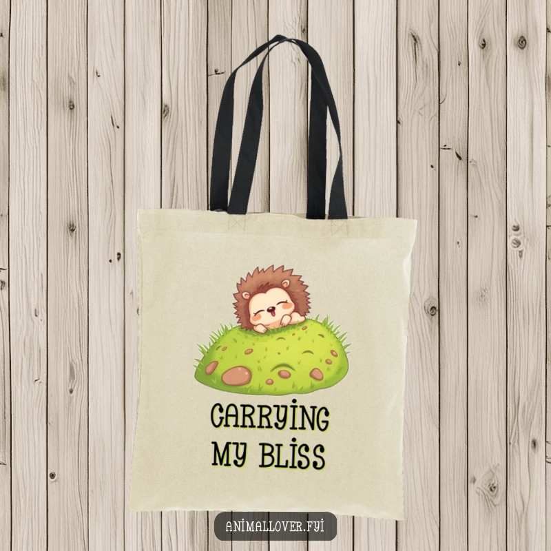Funny tote bag designed with a happy hedgehog rolling down a grassy hill with eyes closed, perfect for carrying items joyfully.