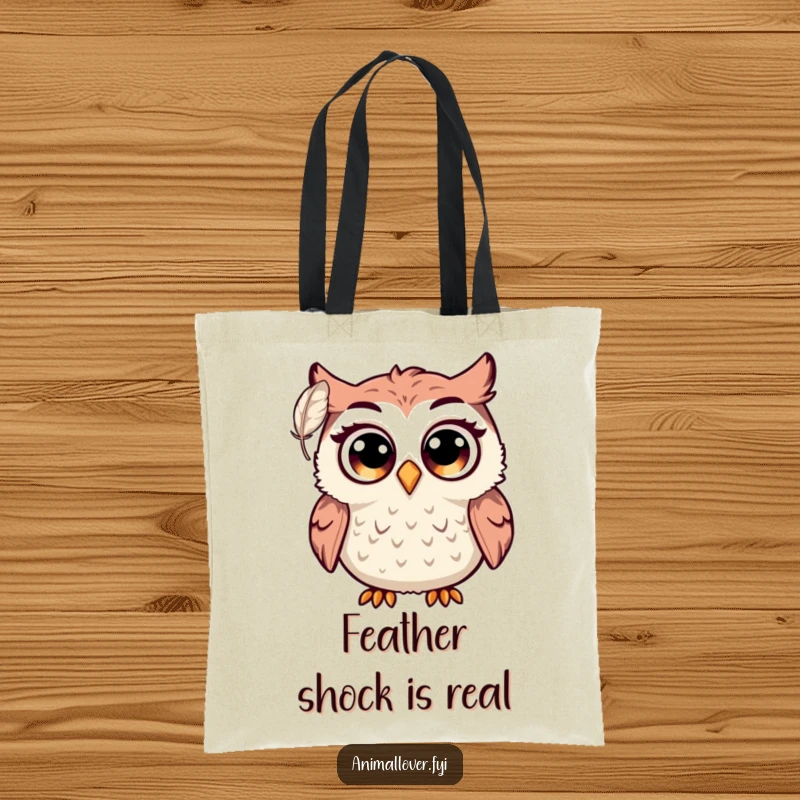 Funny owl tote bag featuring a shocked bird with enormous eyes startled by a delicately floating feather. Humorous accessory.